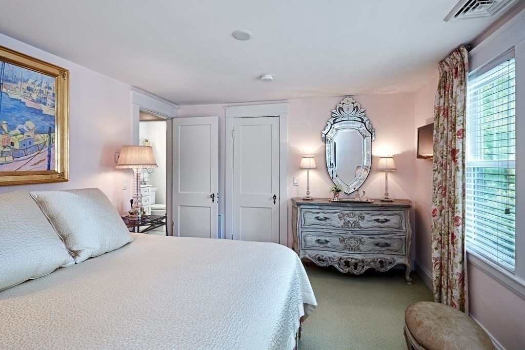 42 Buckmaster Road Westwood, MA 02090 - Photo 16 of 27 a bedroom with a bed and a dresser