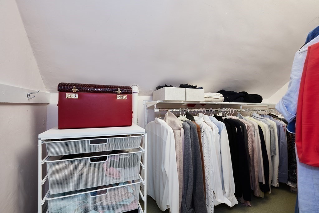 42 Buckmaster Road Westwood, MA 02090 - Photo 17 of 27 a view of walk in closet with clothes and shoes