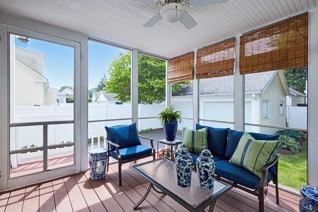 42 Buckmaster Road Westwood, MA 02090 - Photo 24 of 27 a living room with furniture and a large window