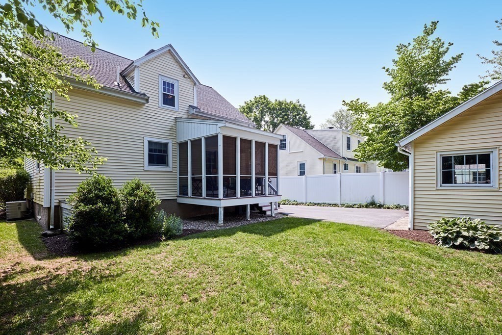 42 Buckmaster Road Westwood, MA 02090 - Photo 26 of 27 a house view with a garden space