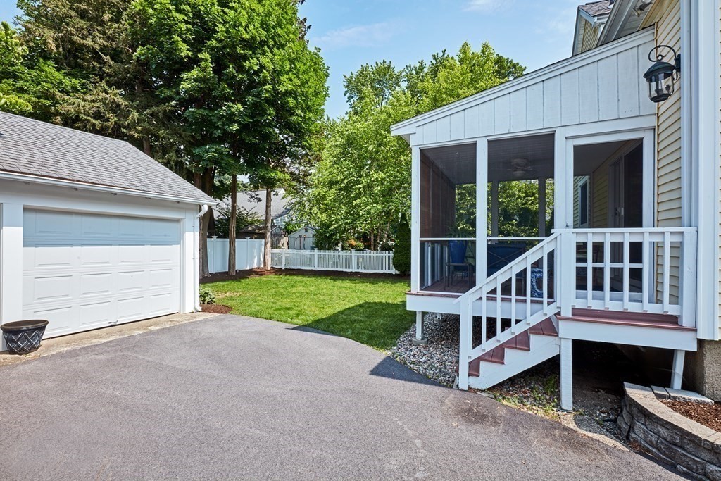 42 Buckmaster Road Westwood, MA 02090 - Photo 27 of 27 a view of a house with backyard and porch