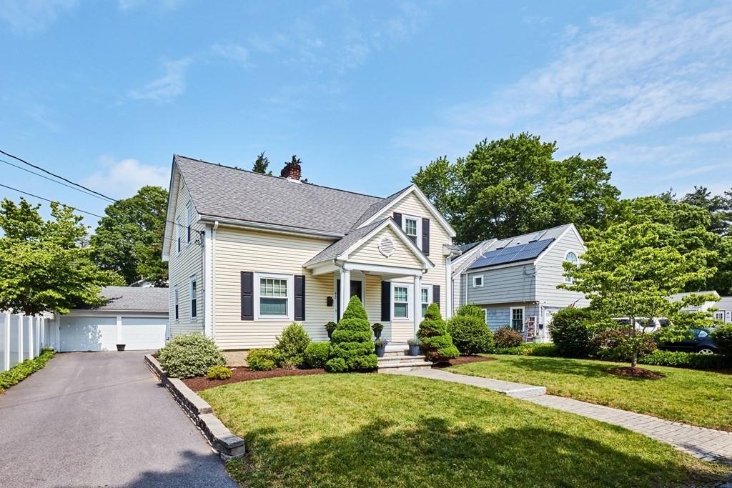 42 Buckmaster Road Westwood, MA 02090 - Photo 3 of 27 a front view of a house with a yard