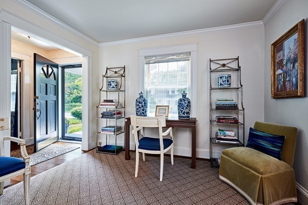42 Buckmaster Road Westwood, MA 02090 - Photo 6 of 27 a view of a livingroom with furniture and a window