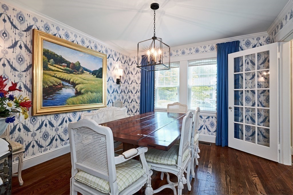 42 Buckmaster Road Westwood, MA 02090 - Photo 10 of 27 a view of a dining room with furniture large window and wooden floor
