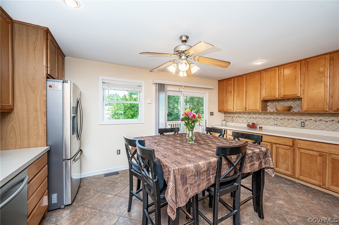 4202 Gladewater Road Henrico, VA 23294 - Photo 13 of 49 a view of a dining room with furniture window and wooden floor