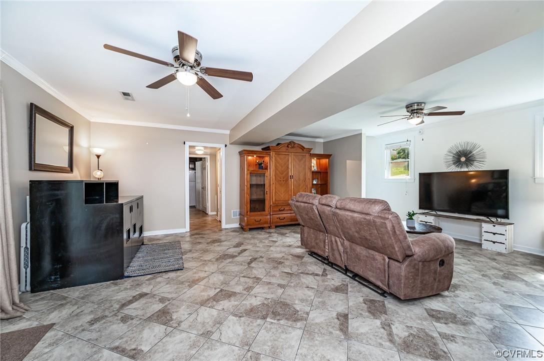 4202 Gladewater Road Henrico, VA 23294 - Photo 18 of 49 a living room with furniture and a flat screen tv