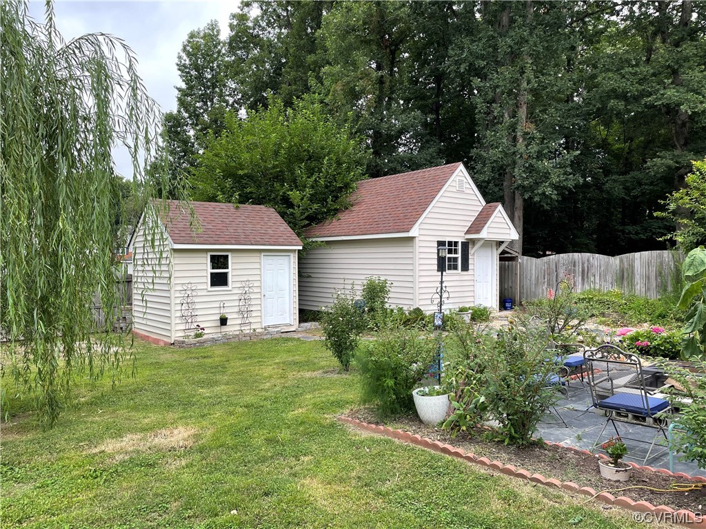 4202 Gladewater Road Henrico, VA 23294 - Photo 43 of 49 a front view of a house with garden