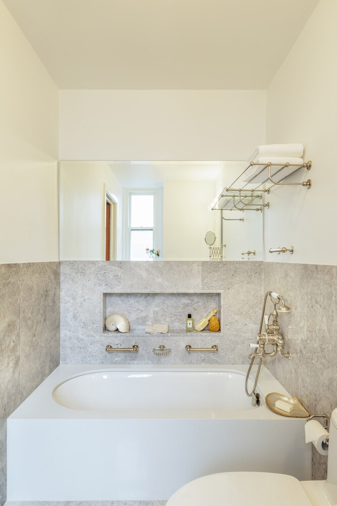 765 Park Avenue, Unit MASIONC Manhattan, NY 10021 - Photo 16 of 29 a bathroom with a sink and a mirror