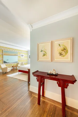 a living room with furniture and a table