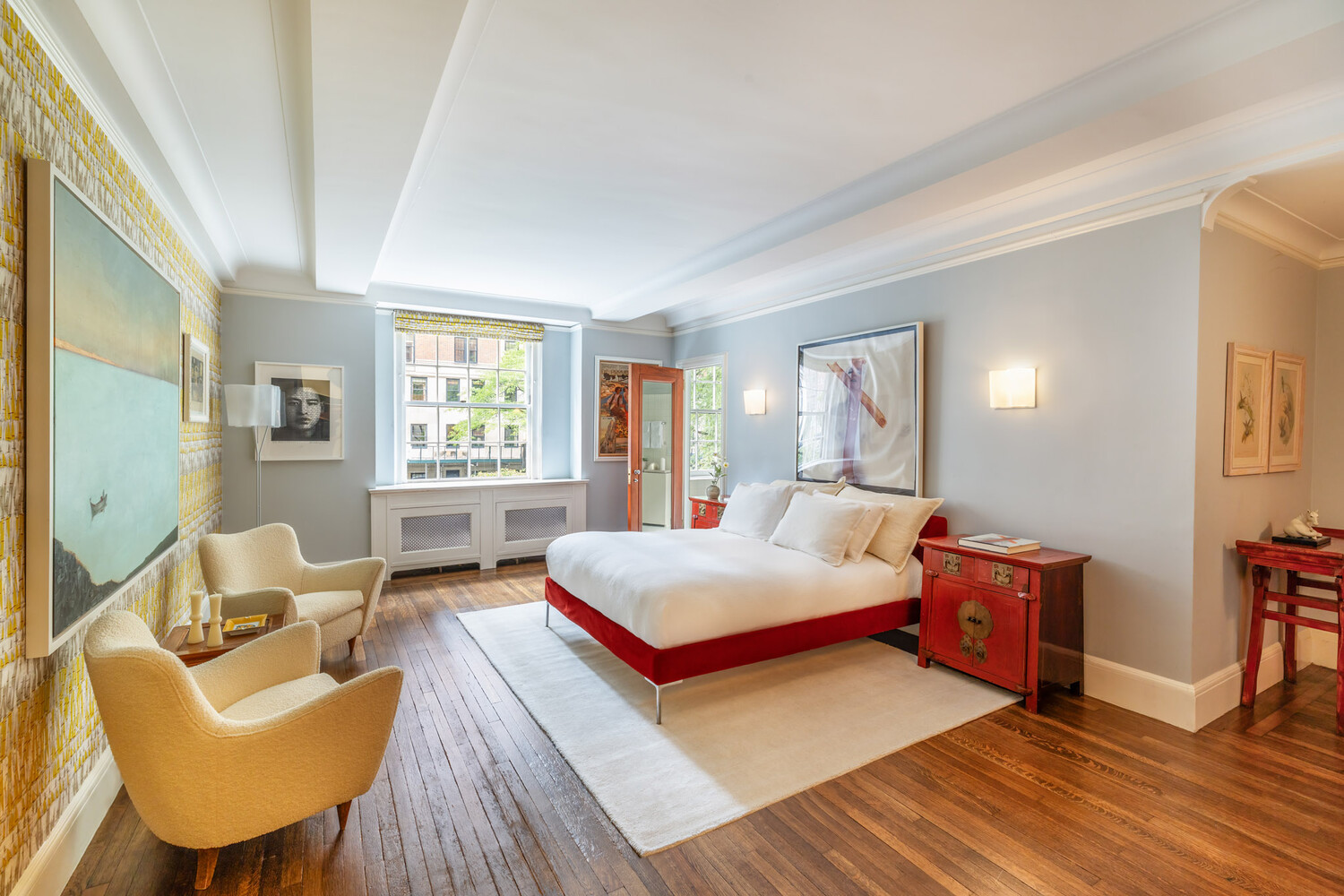 765 Park Avenue, Unit MASIONC Manhattan, NY 10021 - Photo 20 of 29 a bedroom with a bed and wooden floor