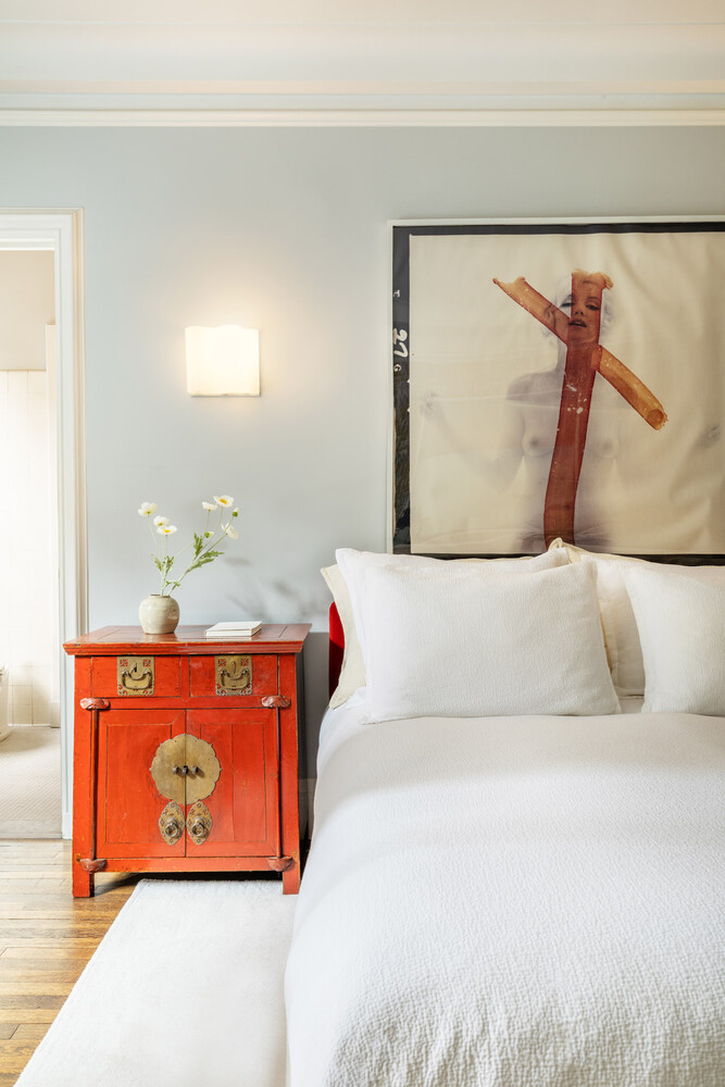 765 Park Avenue, Unit MASIONC Manhattan, NY 10021 - Photo 21 of 29 a bedroom with a bed and a painting on the wall