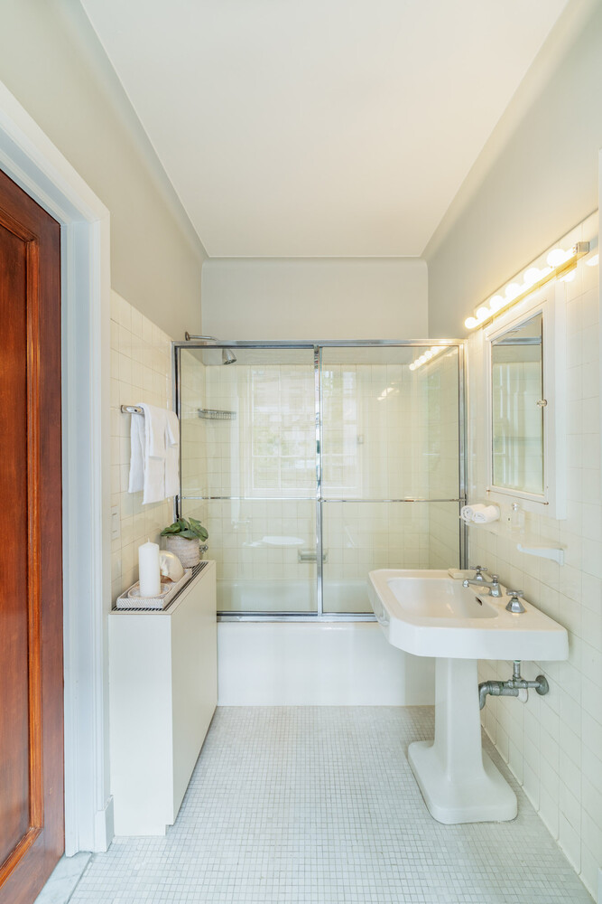 765 Park Avenue, Unit MASIONC Manhattan, NY 10021 - Photo 22 of 29 a bathroom with a sink toilet and shower