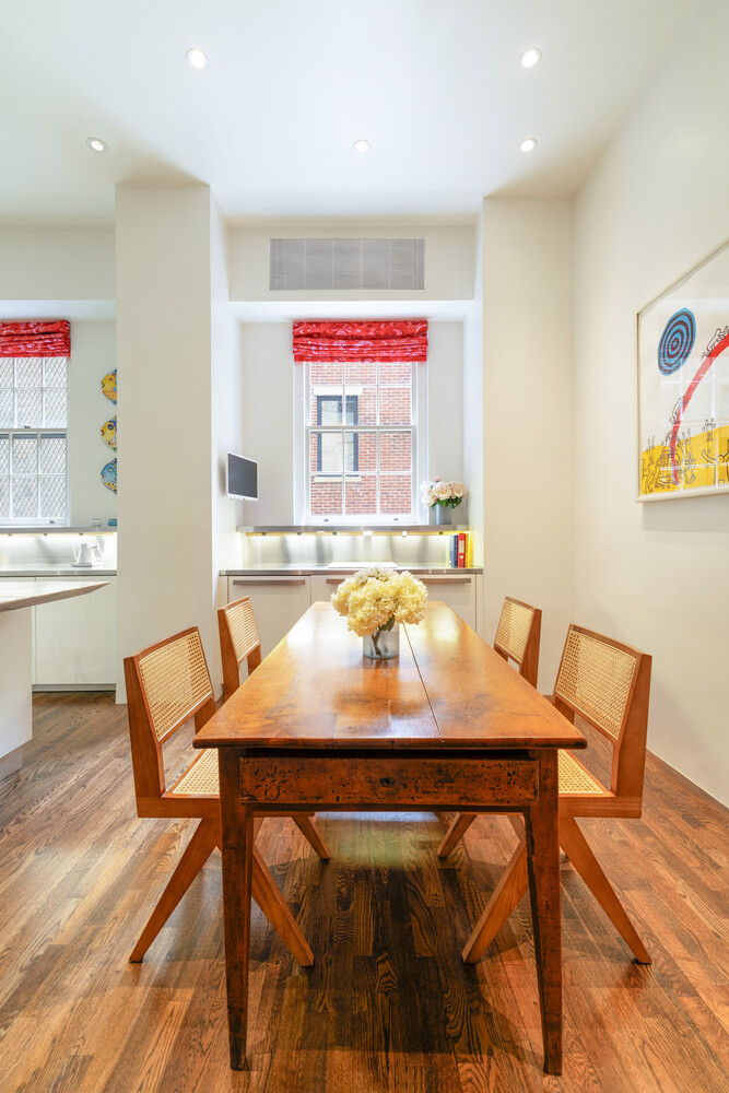 765 Park Avenue, Unit MASIONC Manhattan, NY 10021 - Photo 9 of 29 a view of a dining room with furniture and wooden floor