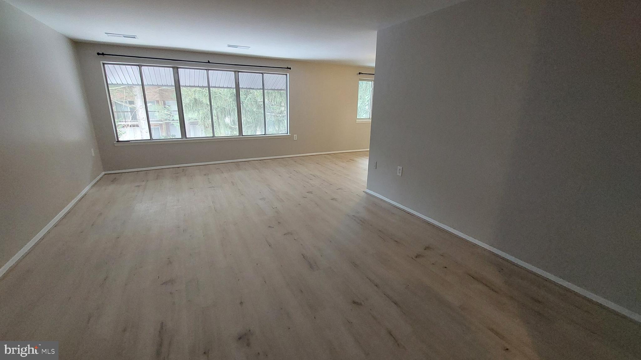 18622 Walkers Choice Road, Unit 6 Montgomery Village, MD 20886 - Photo 6 of 37 Living Room 3