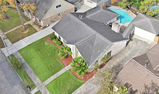 an aerial view of a swimming pool
