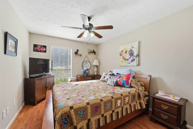 a bathroom with a bathtub and window