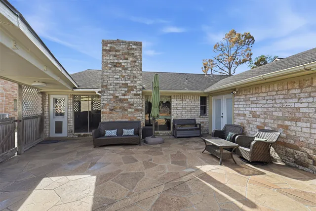 a bathroom with a sink mirror and a shower curtain
