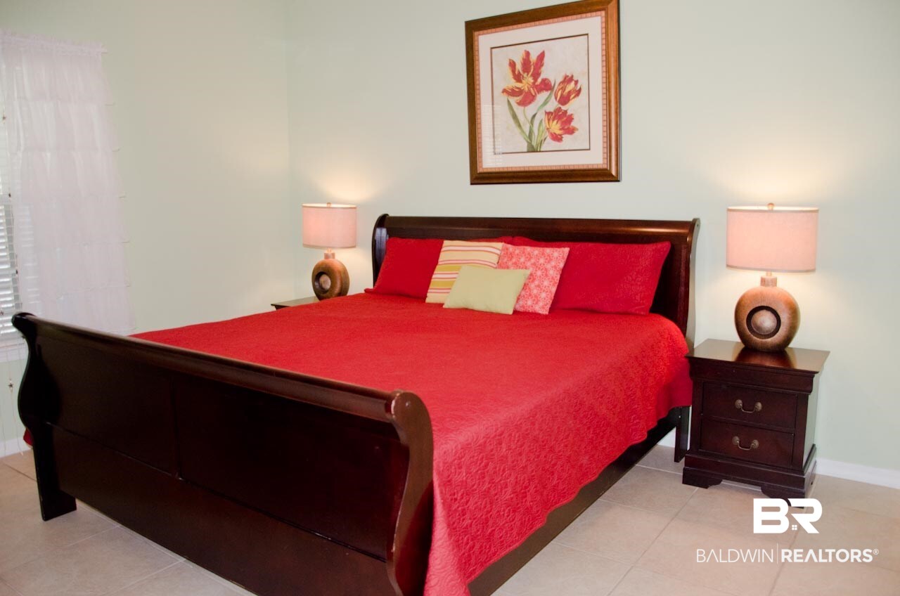 4351 Lindsey Lane, Unit A Orange Beach, AL 36561 - Photo 11 of 29 King Bed in Master Bedroom