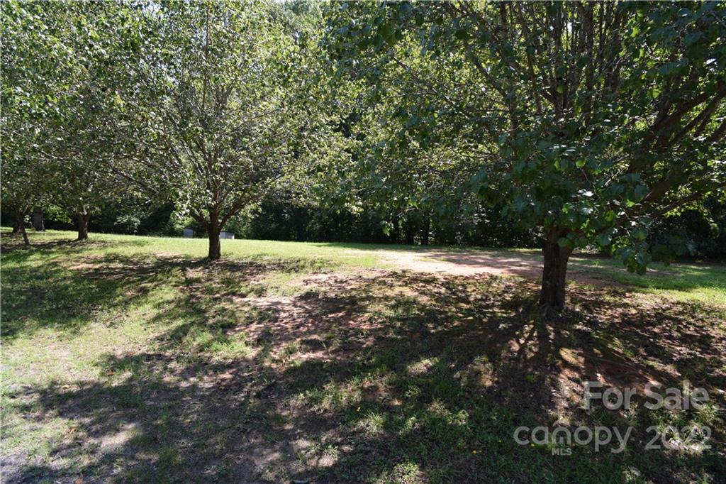0 McCarver Road Gastonia, NC 28056 - Photo 2 of 3 a view of a tree with a yard