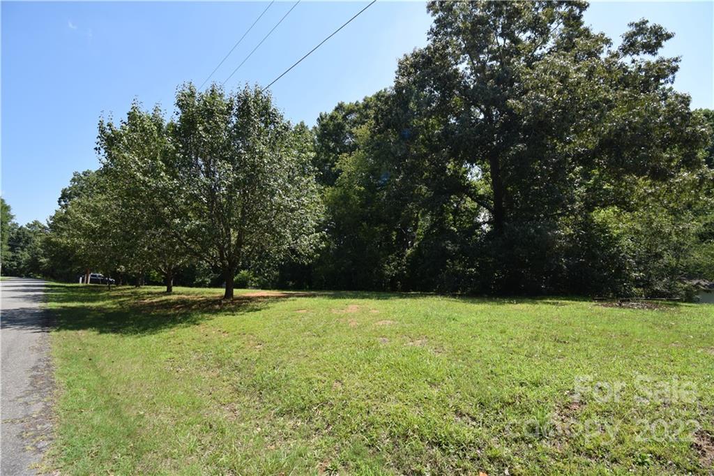 0 McCarver Road Gastonia, NC 28056 - Photo 3 of 3 a view of a field with trees in the background