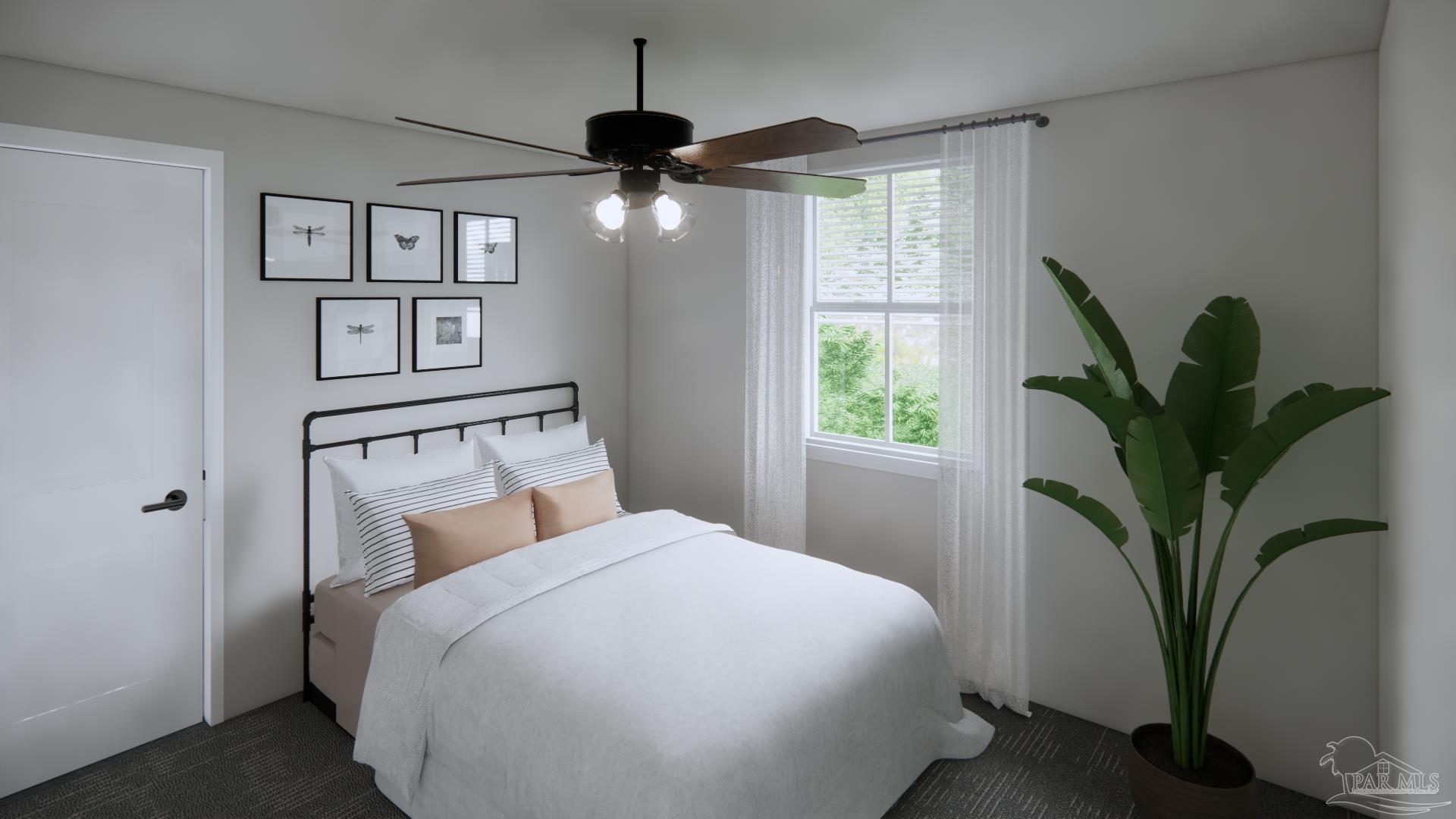 4388 Russell Elliott Road, Unit 37 Jay, FL 32565 - Photo 14 of 18 a bedroom with a large bed and a potted plant