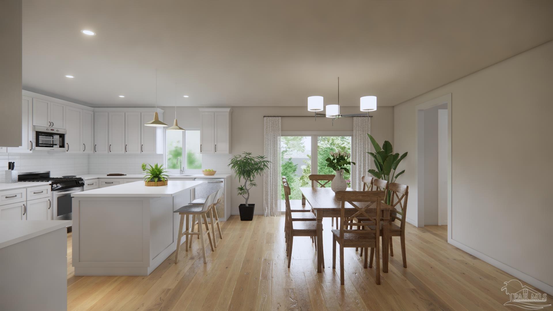 4388 Russell Elliott Road, Unit 37 Jay, FL 32565 - Photo 7 of 18 a view of a dining room with furniture and wooden floor