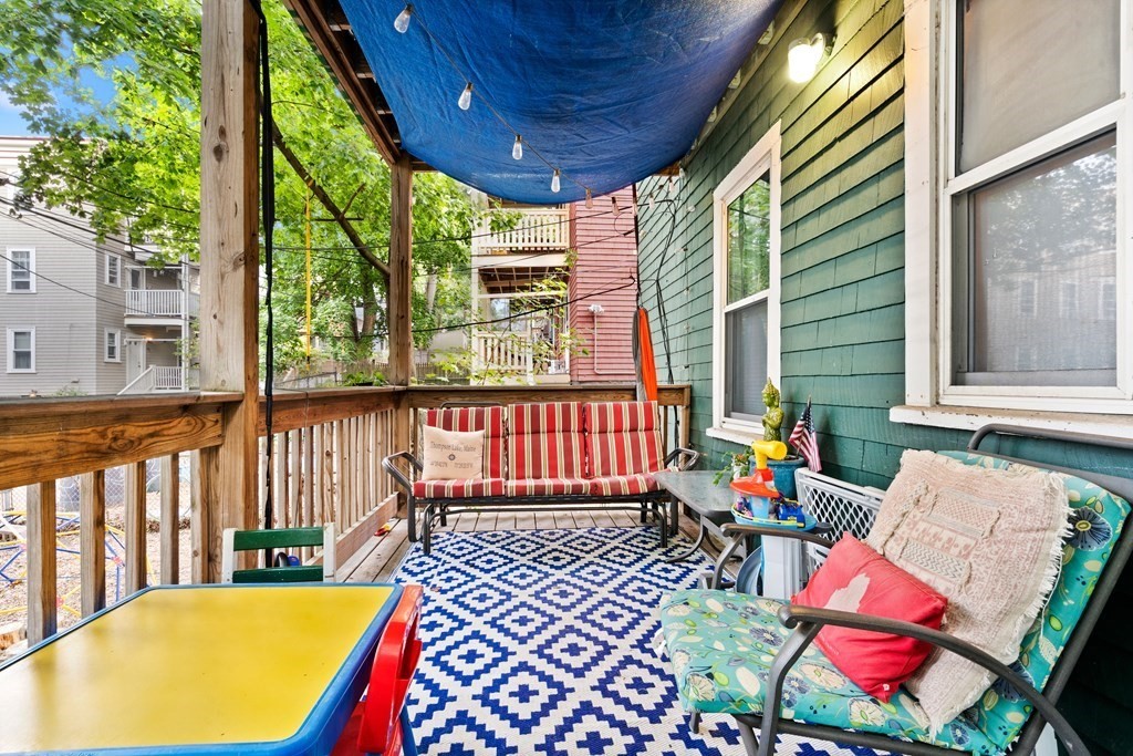 70 Montebello Road, Unit 1 Boston, MA 02130 - Photo 13 of 20 an outdoor sitting area with couch