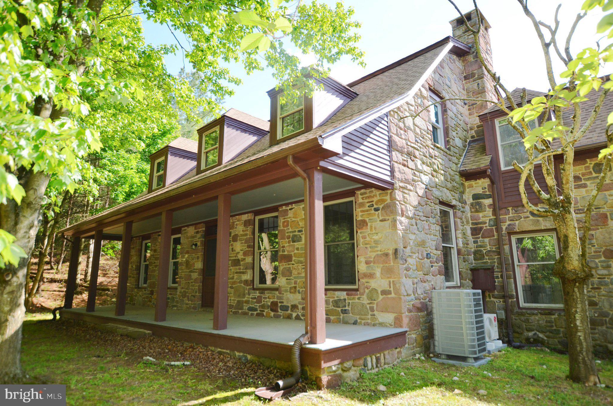 3414 Trone Road Glenville, PA 17329 - Photo 4 of 40 Charming stone home embraced by nature.