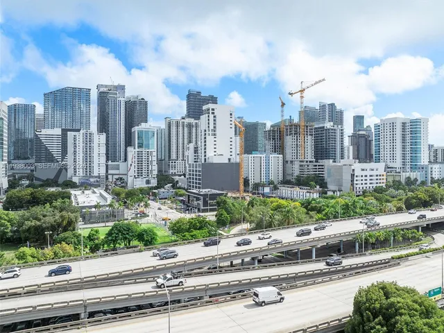 a view of a city with tall buildings