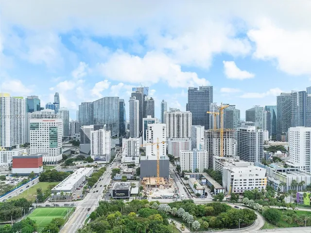 a view of a city with tall buildings
