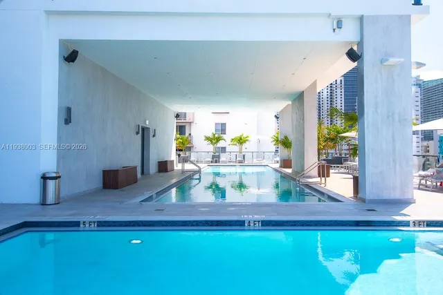 a view of living room with furniture and window