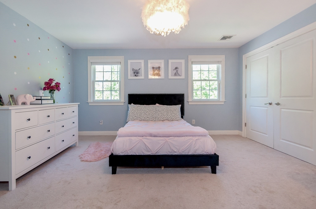 248 Alley Road Rochester, MA 02770 - Photo 24 of 39 a bedroom with a bed and window