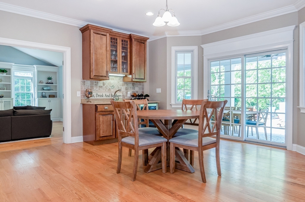 248 Alley Road Rochester, MA 02770 - Photo 9 of 39 a view of a dining room with furniture and wooden floor