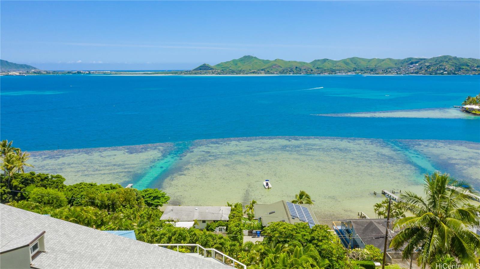 45-013 Lilipuna Road, Unit 4 Kaneohe, HI 96744 - Photo 1 of 1 a view of a lake with a lake