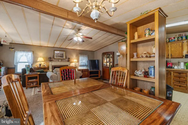 a kitchen with stainless steel appliances granite countertop a refrigerator a stove a sink dishwasher and a refrigerator with the cabinets