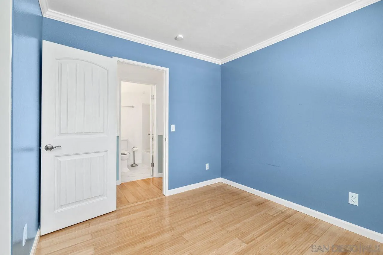 14215 Sutter Mill Way Poway, CA 92064 - Photo 19 of 38 a view of empty room with wooden floor