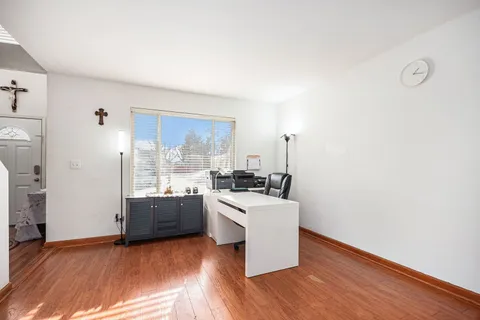 a room with a stove and a window