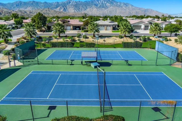 an aerial view of a tennis ground