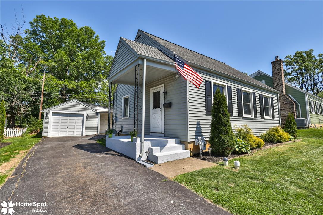 415 Willow Road Hellertown, PA 18055 - Photo 1 of 25 A charming single-family residence with an inviting front porch and a detached garage.