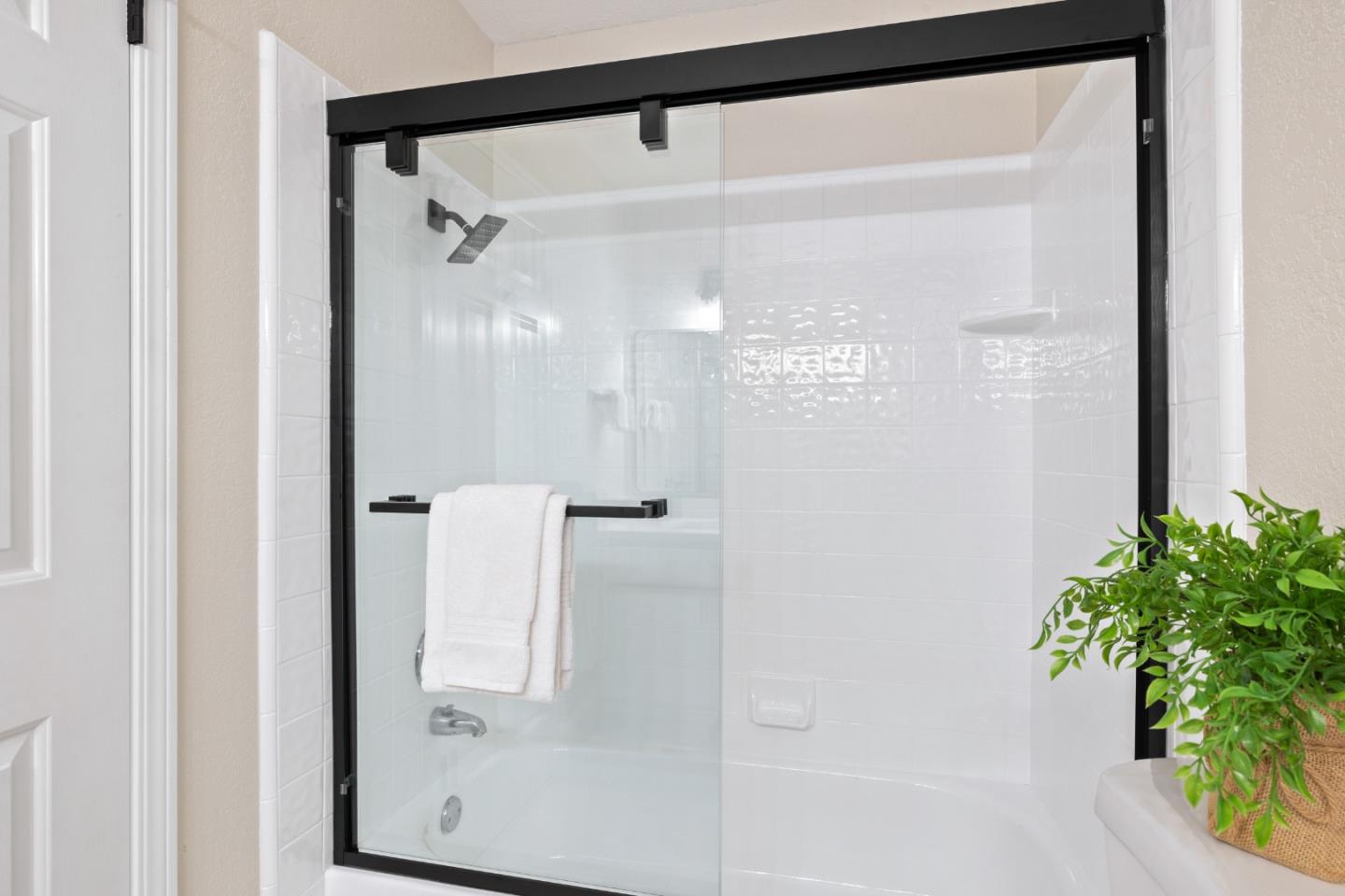 1148 Kayellen Court San Jose, CA 95125 - Photo 13 of 23 a bathroom with a glass shower door
