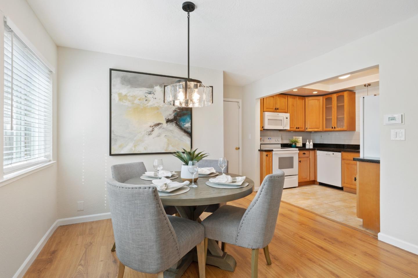 1148 Kayellen Court San Jose, CA 95125 - Photo 6 of 23 a view of a dining room with furniture window and wooden floor