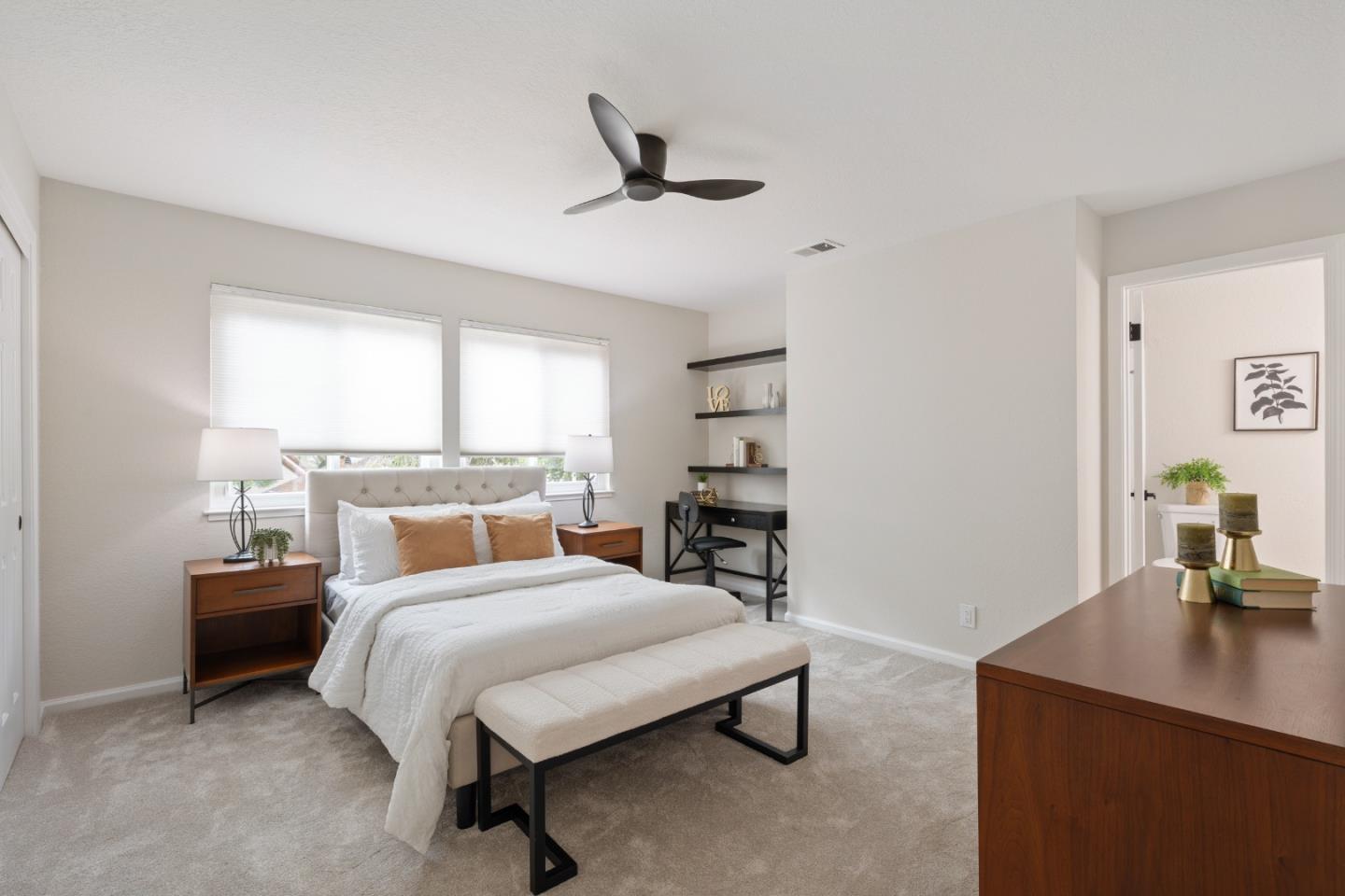 1148 Kayellen Court San Jose, CA 95125 - Photo 10 of 23 a bedroom with a bed a couch and a large window