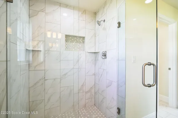 a view of a room with racks on the wall