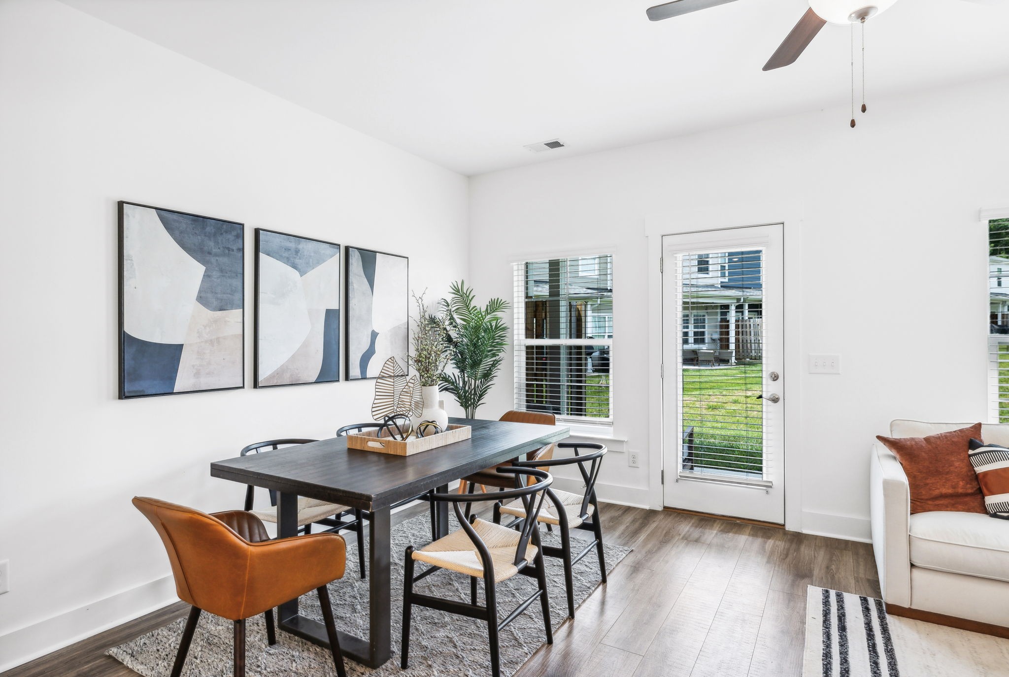 500 Black Tea Way Franklin, TN 37064 - Photo 15 of 68 a view of a dining room with furniture and wooden floor
