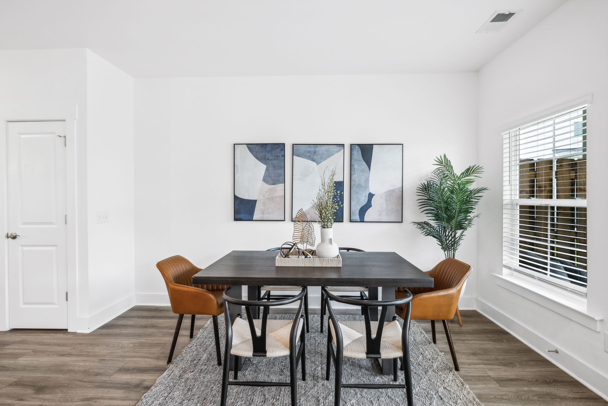 500 Black Tea Way Franklin, TN 37064 - Photo 16 of 68 a view of a dining room with furniture and wooden floor