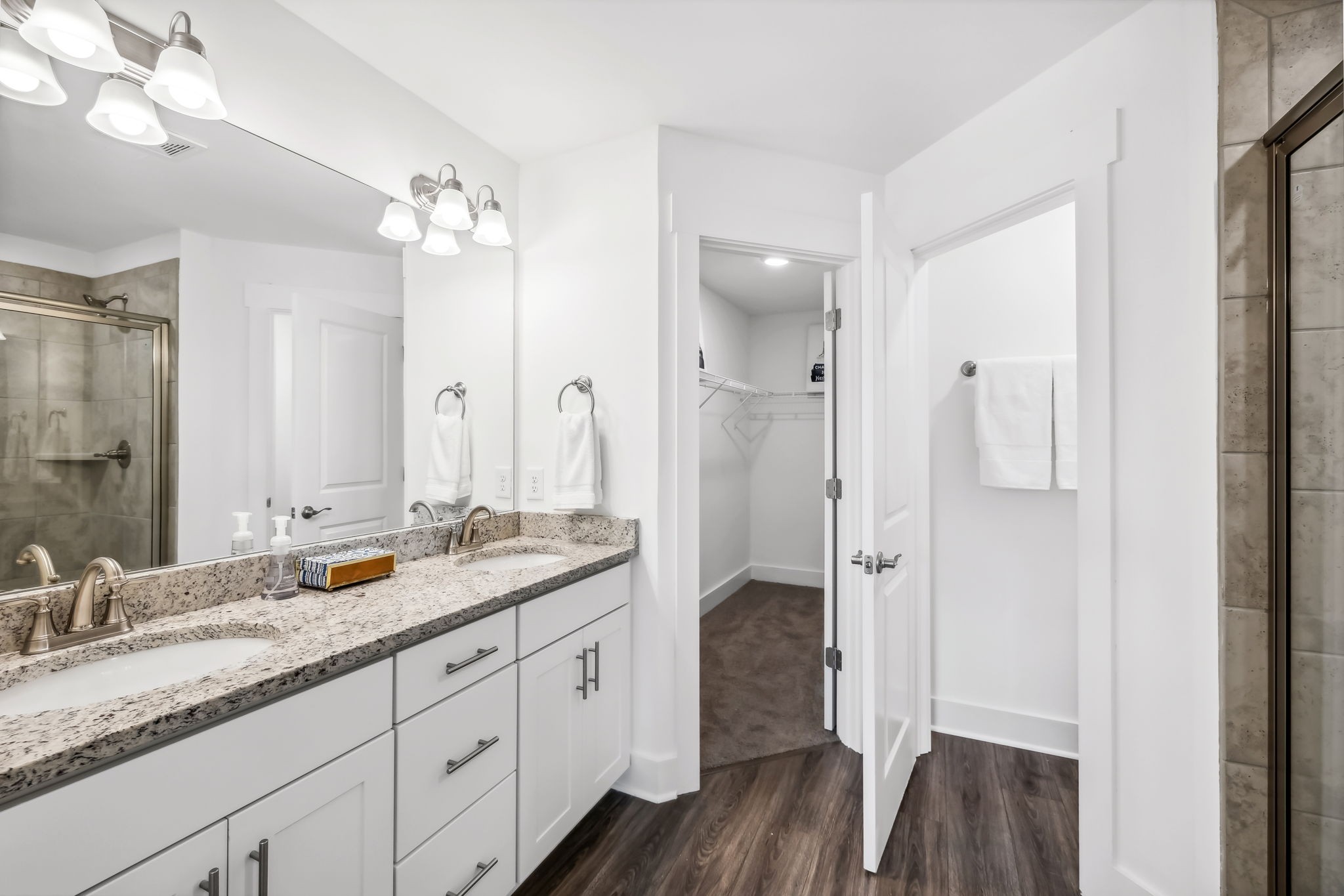 500 Black Tea Way Franklin, TN 37064 - Photo 25 of 68 a bathroom with a granite countertop sink mirror and double