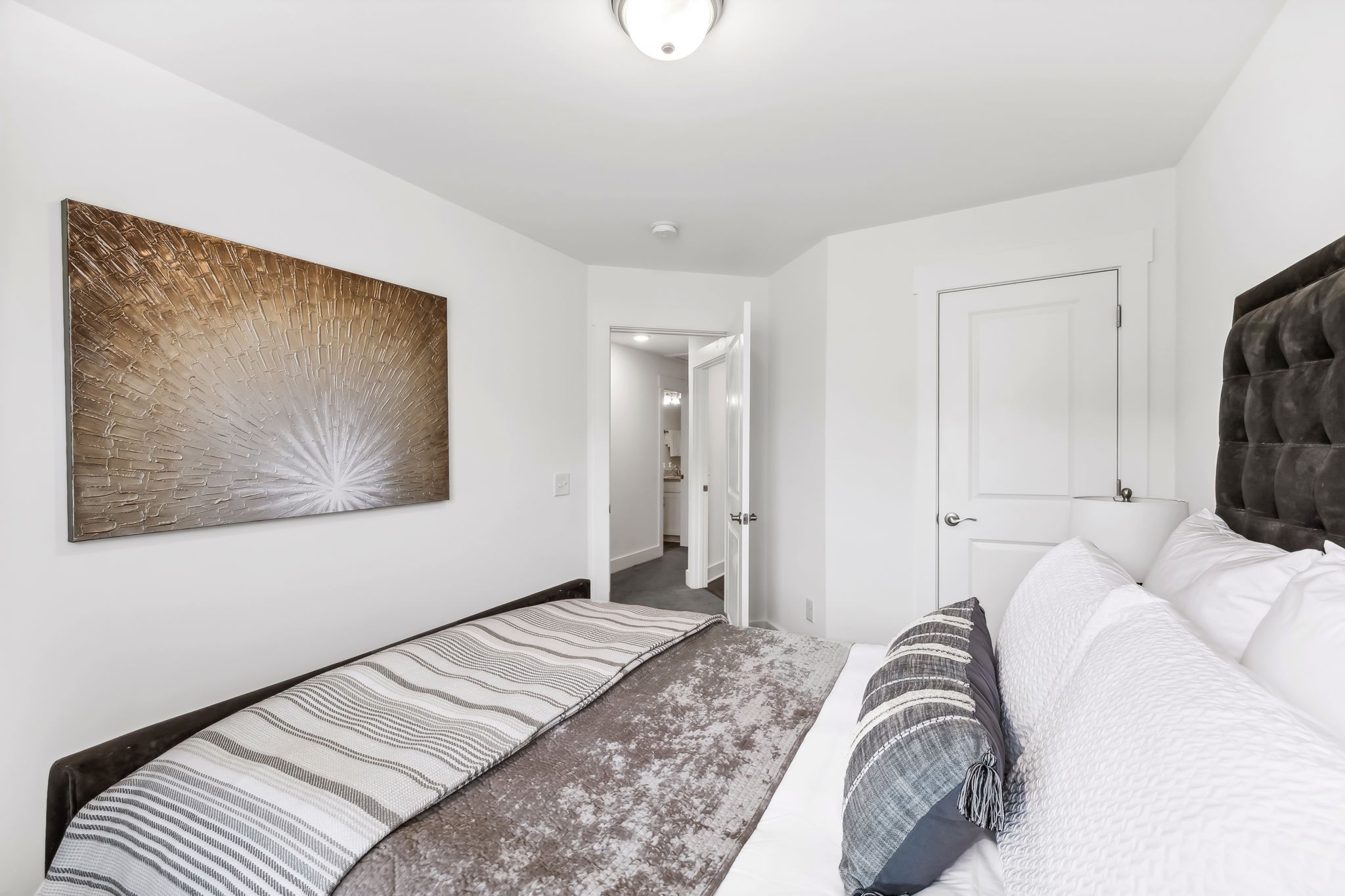 500 Black Tea Way Franklin, TN 37064 - Photo 32 of 68 a bedroom with a bed and a painting on the wall