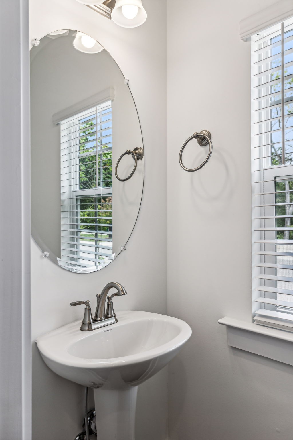500 Black Tea Way Franklin, TN 37064 - Photo 35 of 68 a bathroom with a sink a mirror and a window