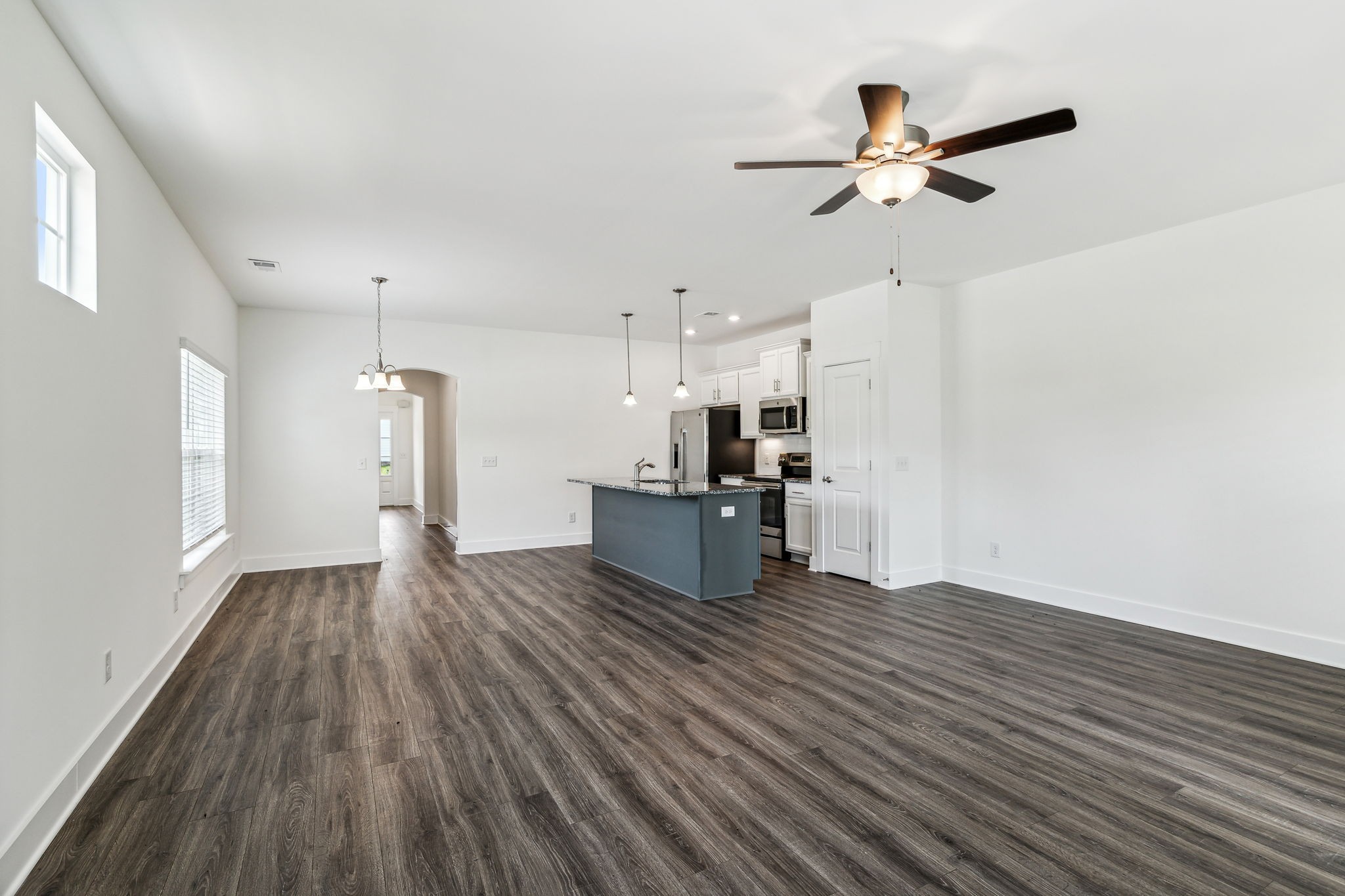 500 Black Tea Way Franklin, TN 37064 - Photo 43 of 68 a view of empty room with wooden floor and a ceiling fan