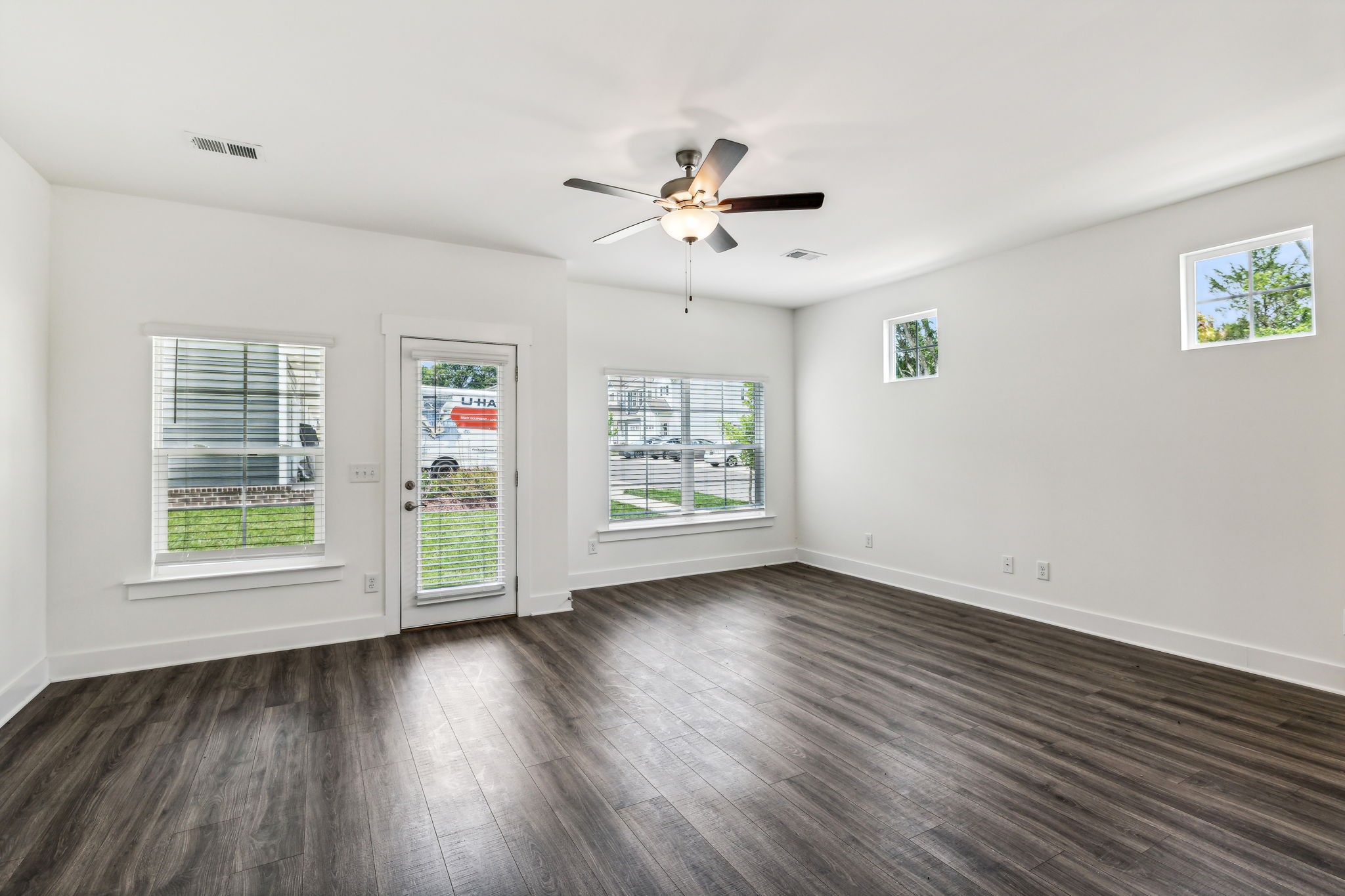 500 Black Tea Way Franklin, TN 37064 - Photo 45 of 68 a view of an empty room with wooden floor and a window